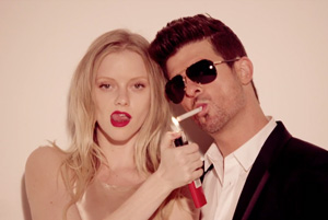 Robin Thicke ft. T.I. & Pharrell - Blurred Lines